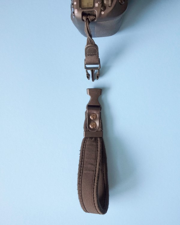 A detachable camera hand strap is an essential part of my camera equipment. It is light, easy to use and you can leave the short part on when shooting with tripod. 